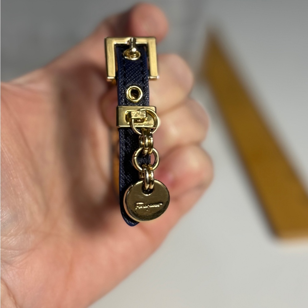Salvatore Ferragamo upcycled navy blue leather bracelet with gold logo chain